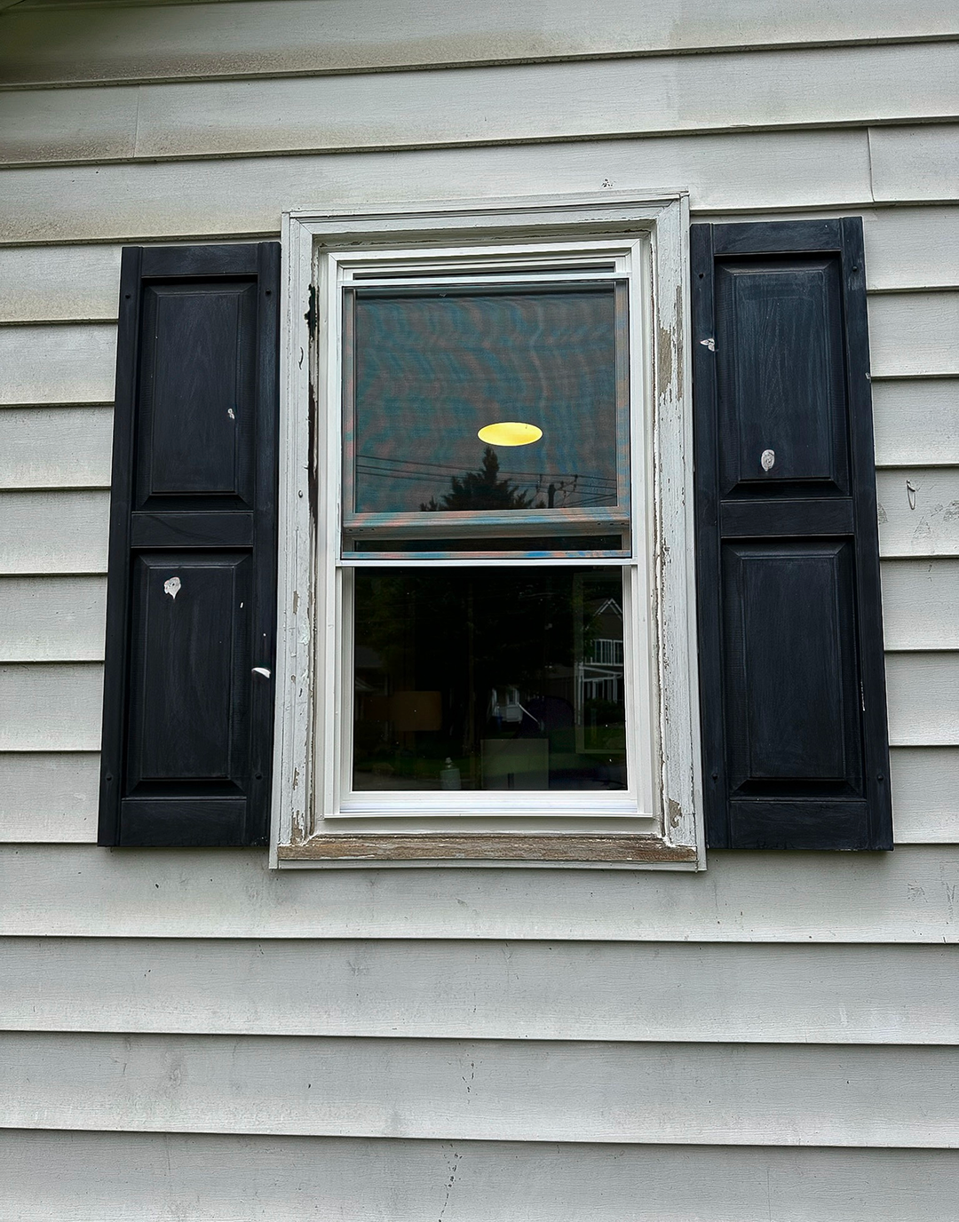 Vinyl Double-Hung Window Replacement before 0 photo.