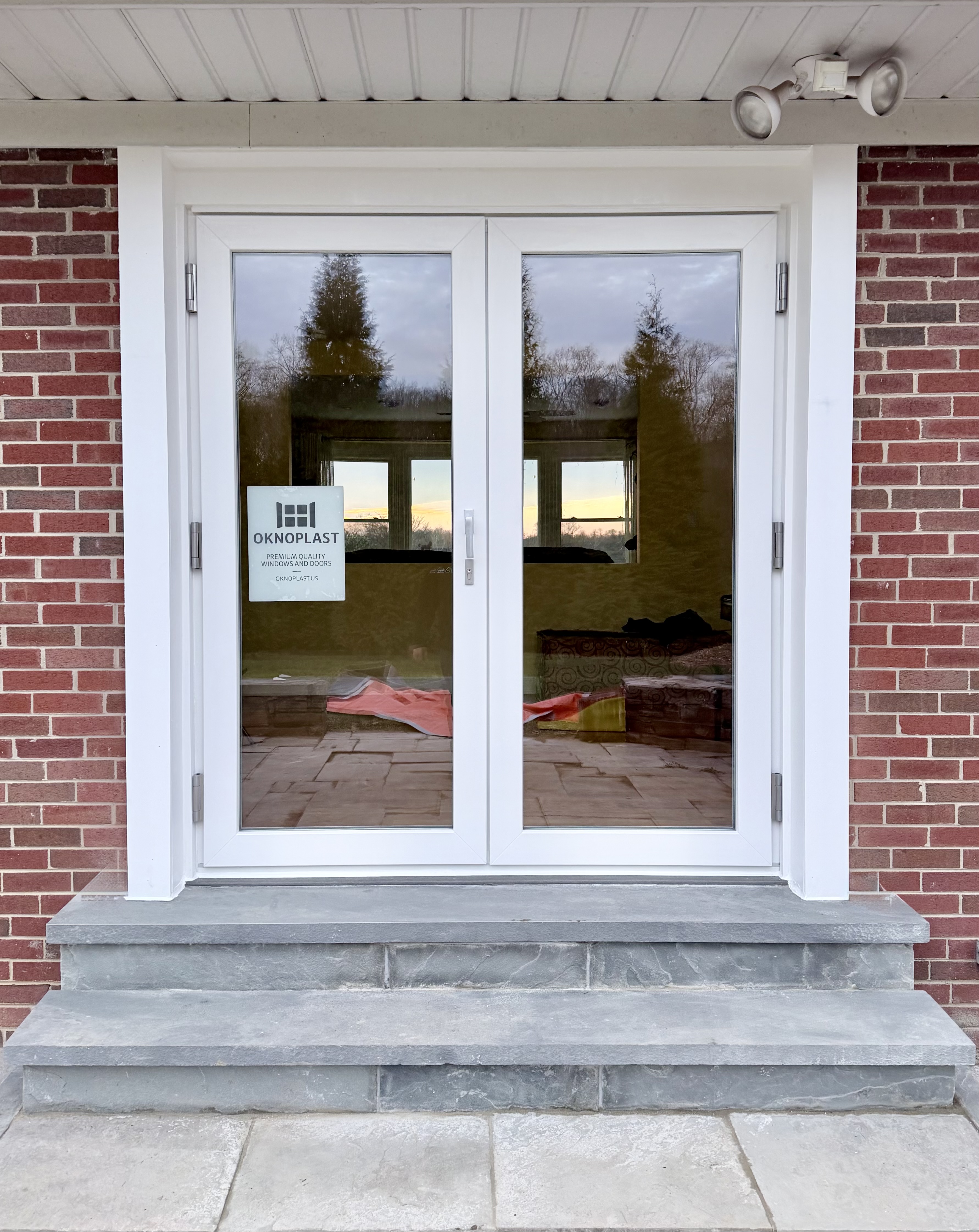 From Window to Elegant Oknoplast French Doors project main photo.