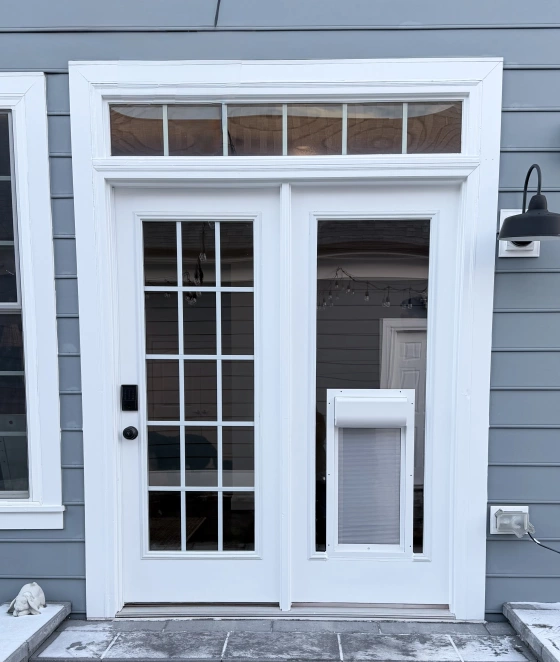French Door Upgrade with Pet Door Installation project photo.